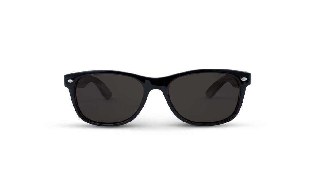 Optic Nerve Cruzin' Wood sunglasses with FSC natural wood temples, black frame, and smoke lenses with a white background