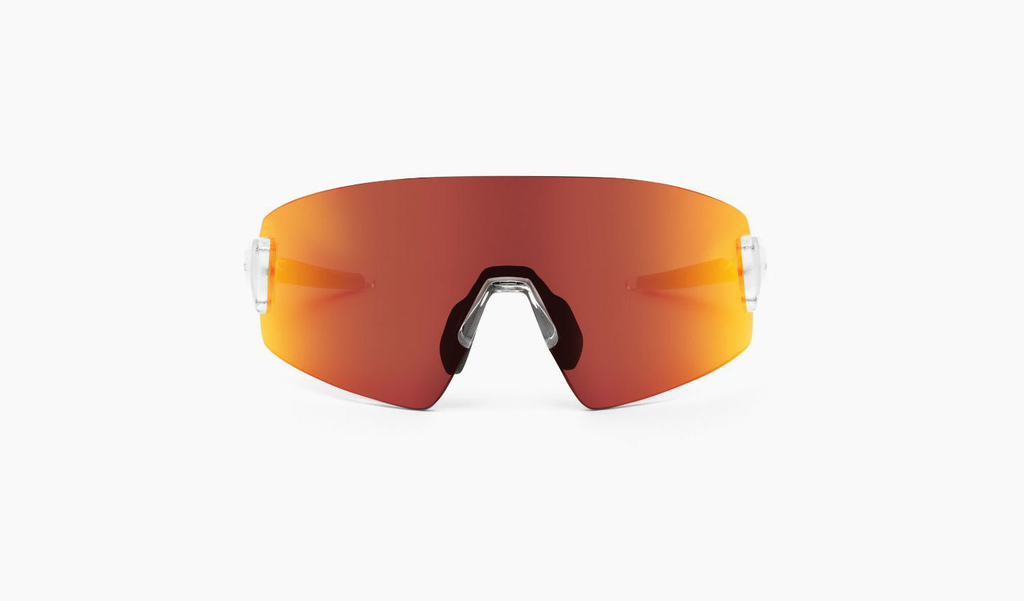 Optic Nerve FixieBLAST sunglasses with a clear frame, smoke lens, and a red mirror on a white background