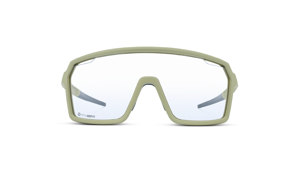 Optic Nerve FixiePHENOM 2.0 sunglasses with a green frame and a clear lens on a white background