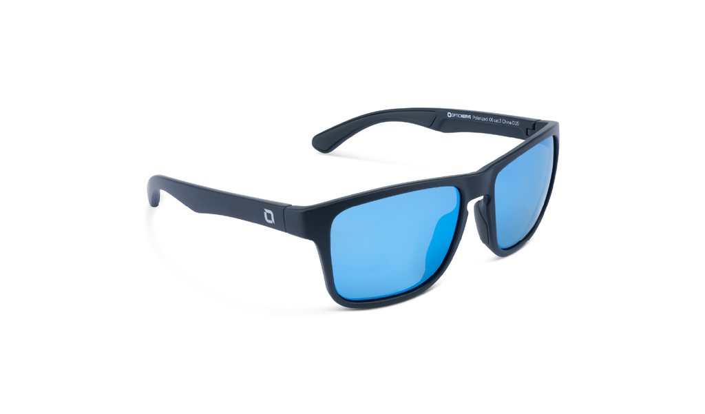 Optic Nerve Zaldaingerous Rumble sunglasses with a black frame, amber lens, and a blue mirror on a white background