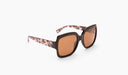 Optic Nerve Asana sunglasses with a black frame and brown lenses on a white background