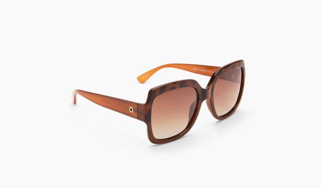 Optic Nerve Asana sunglasses with brown temples, tortoise frame, and brown lenses on a white background