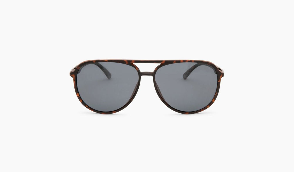 Optic Nerve Govnah sunglasses with a tortoise frame and smoke lenses on a white background