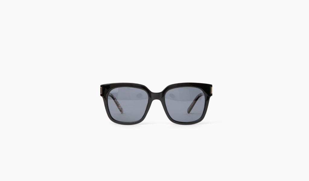 Optic Nerve Gracie sunglasses with a black frame and smoke lenses on a white background
