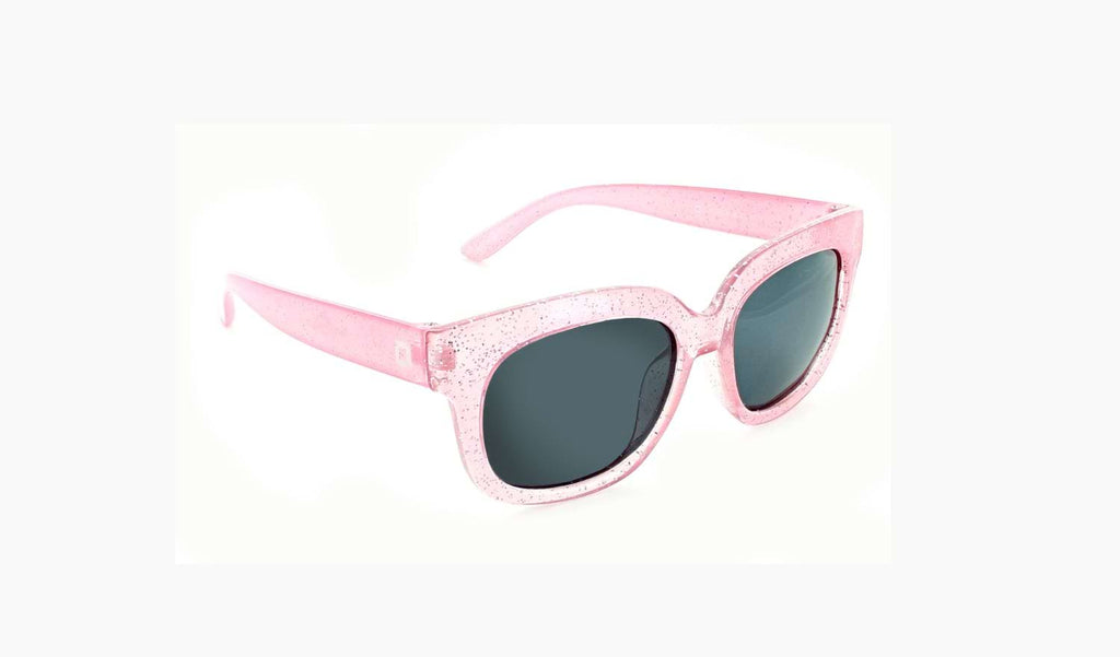 Optic Nerve Kids Tart sunglasses with a sparkly pink frame and smoke lenses on a white background