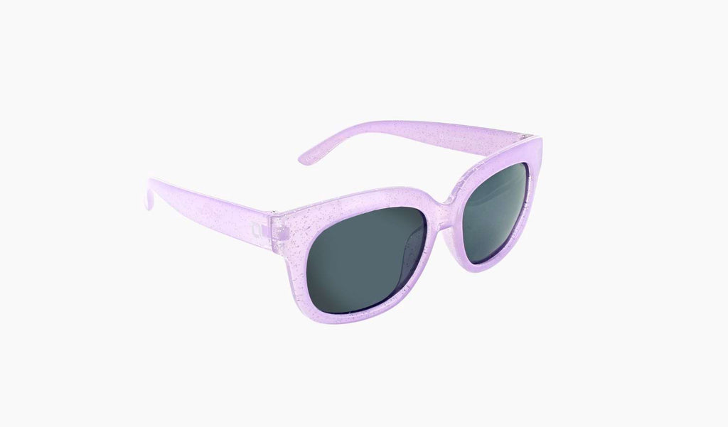 Optic Nerve Kids Tart sunglasses with a sparkle purple frame and smoke lenses on a white background